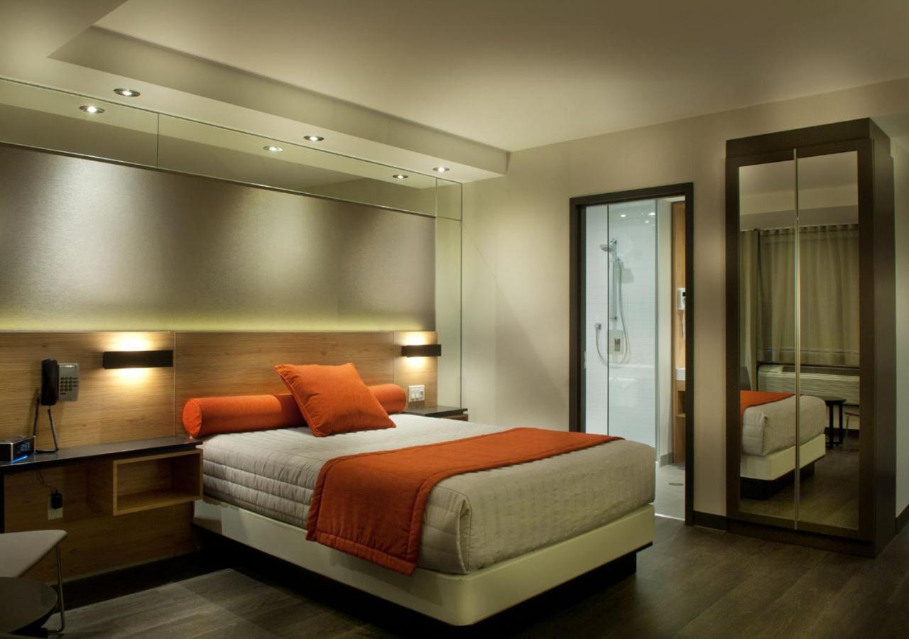 Hotel Ramada By Wyndham Laval Esterno foto